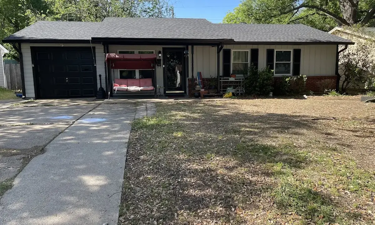 Asphalt Shingle Roof Repair crew at work on a residential roof in Laplace